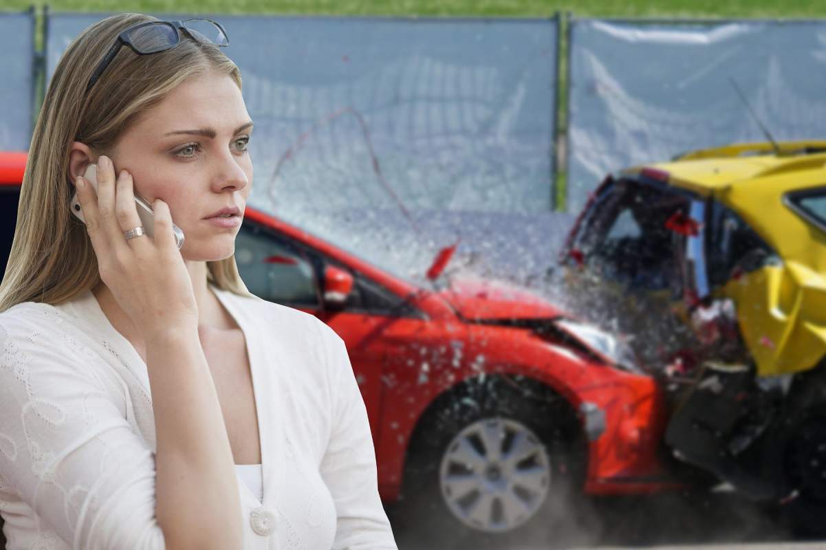 Young women talking on the phone at the accident spot