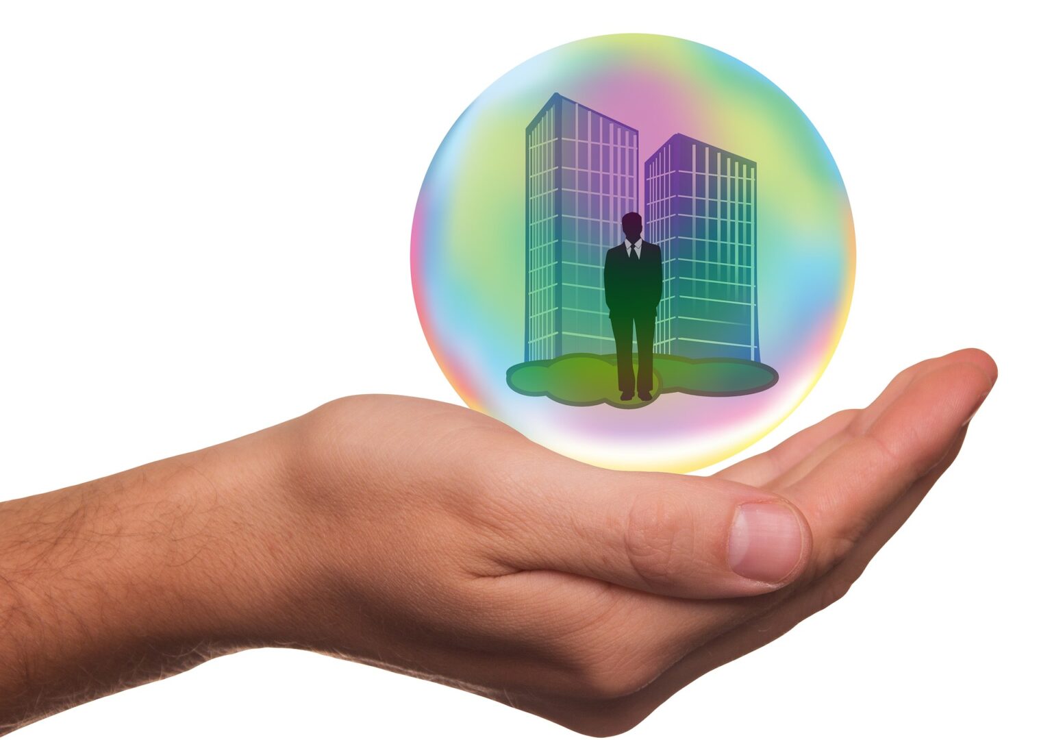 Hand holding bubble which is having image of a business man standing in front of buildings